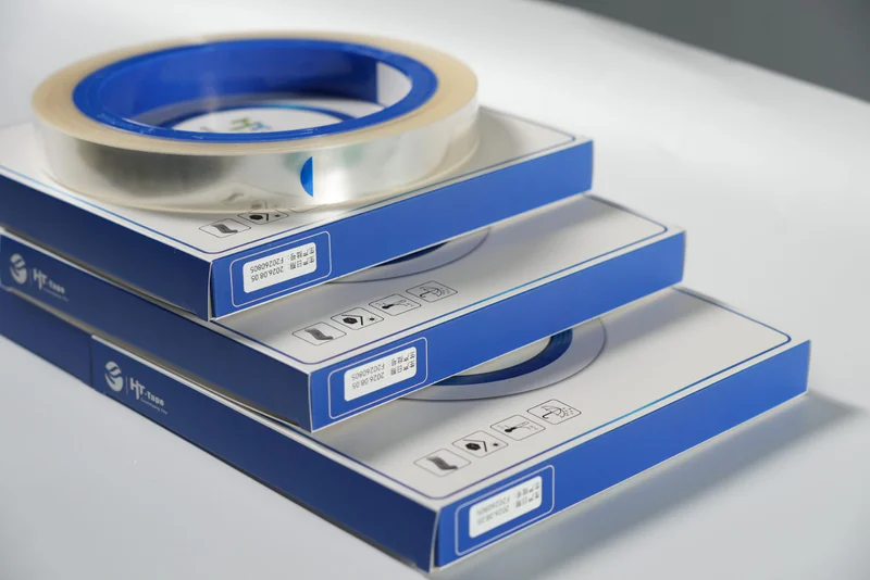 Boxed film rolls with batch labels ready for shipment