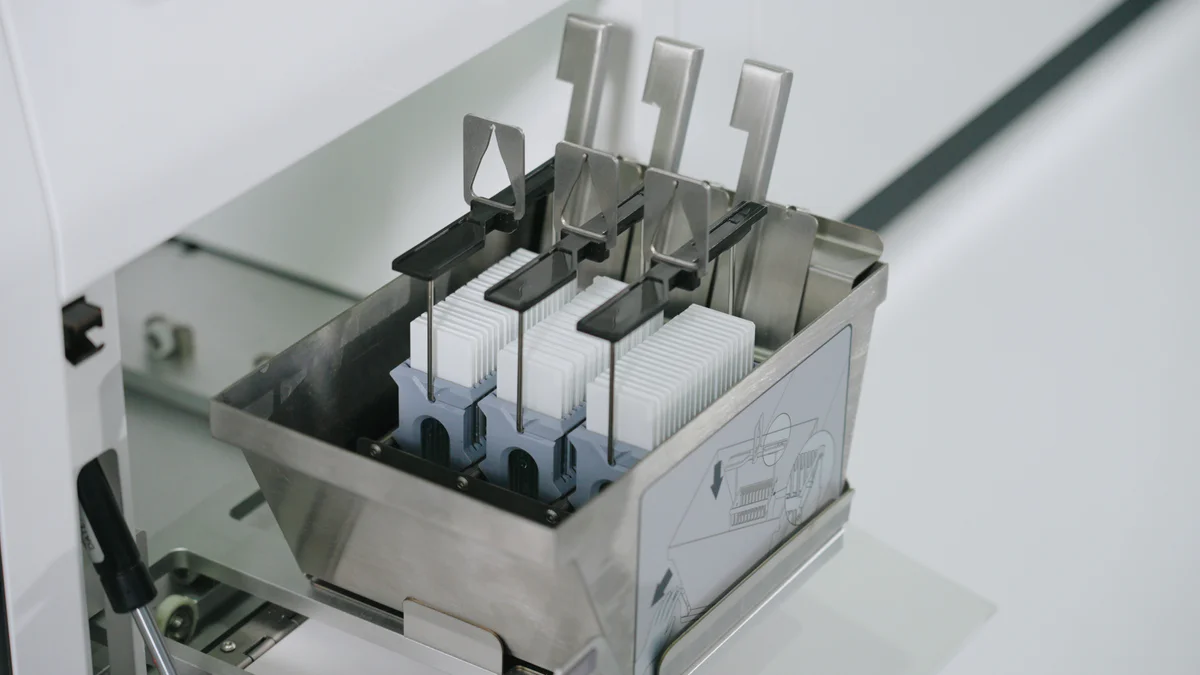 Rack of finished coverslipped slides ready for collection